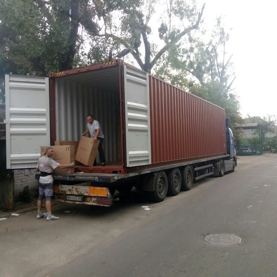 робота вантажників на будівельному об'єкті